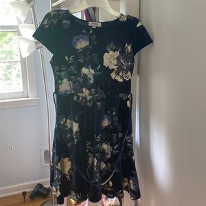 Kids large floral velvet dress. Worn once in great shape. Ties in the front.